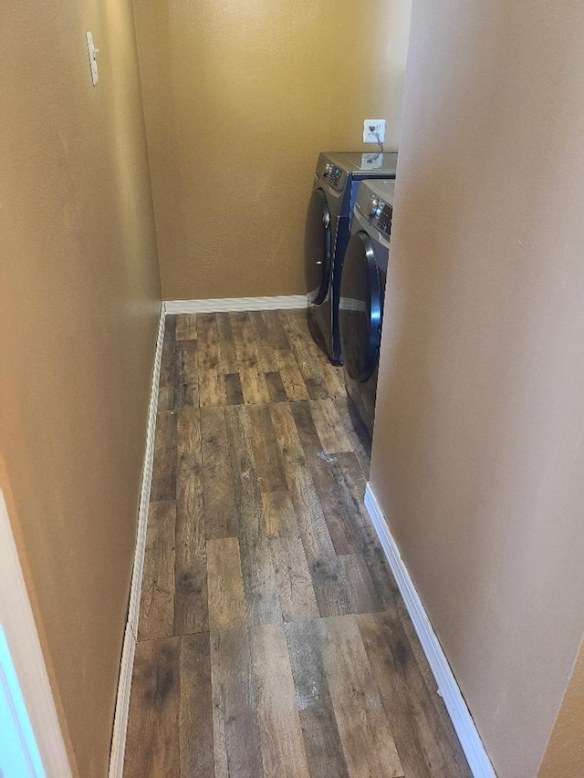 1811 Willow St, San Angelo, TX 76901 - washroom with washer and dryer, hardwood / wood-style flooring, and baseboards