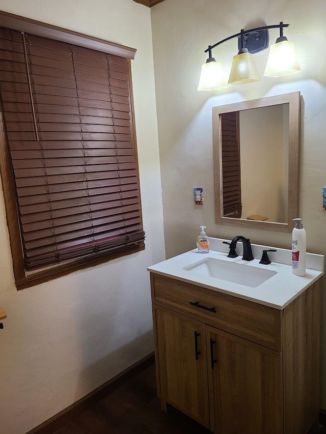 1811 Willow St, San Angelo, TX 76901 - bathroom featuring vanity and wood finished floors