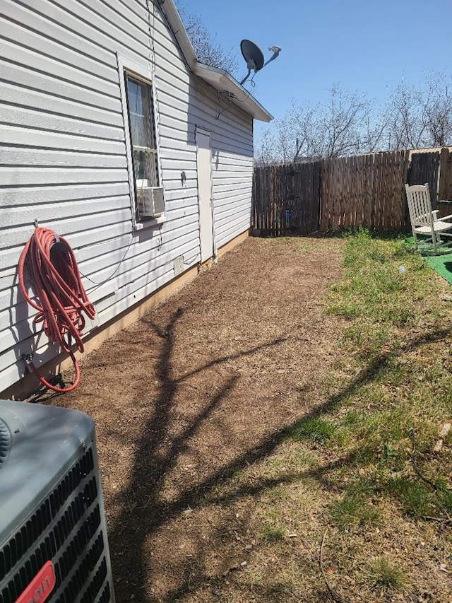 1811 Willow St, San Angelo, TX 76901 - view of yard featuring central AC and cooling unit