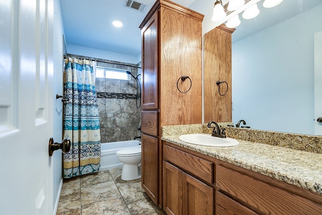 full bathroom with shower / tub combo, vanity, and toilet