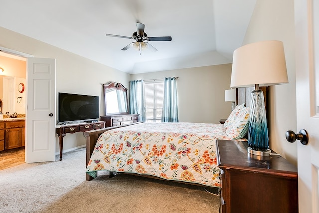 bedroom featuring connected bathroom, sink, ceiling fan, and carpet flooring