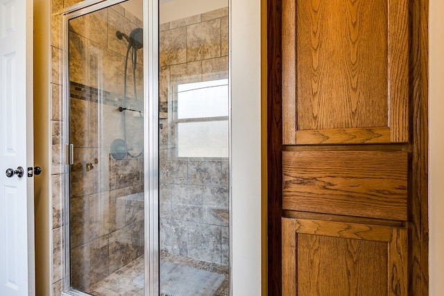 bathroom with an enclosed shower