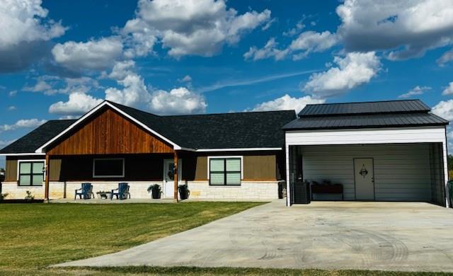 view of front of property with a front lawn