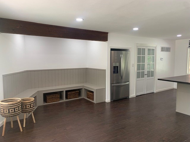 1619 Canal Rd, San Angelo, TX 76904 - unfurnished dining area with dark wood-style floors, recessed lighting, and wainscoting