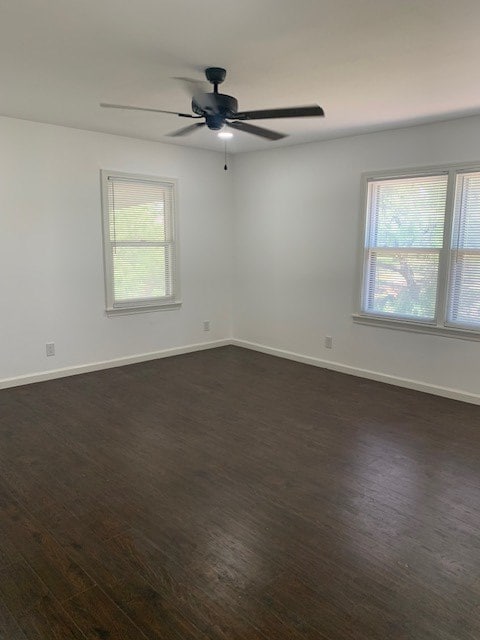 1619 Canal Rd, San Angelo, TX 76904 - empty room with dark wood-style flooring and a ceiling fan