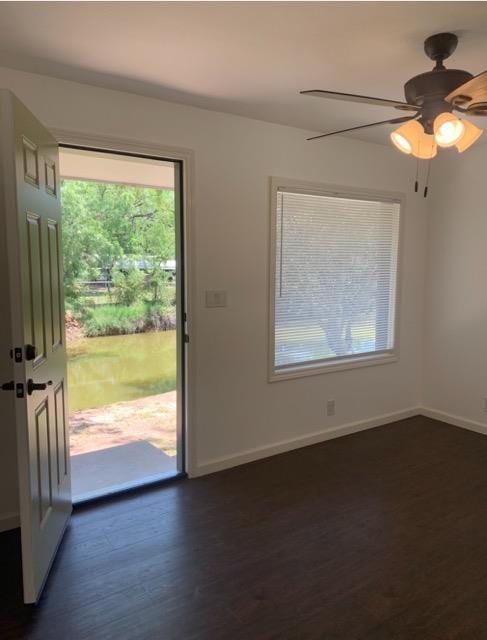 1619 Canal Rd, San Angelo, TX 76904 - foyer featuring dark wood finished floors and a ceiling fan