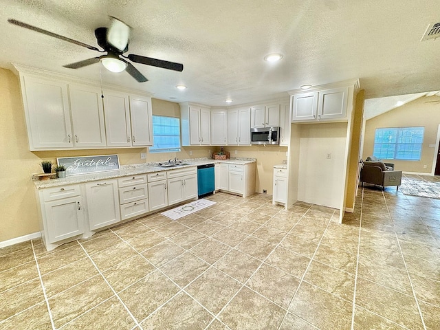 kitchen featuring white cabinetry, dishwasher, sink, ceiling fan, and a textured ceiling