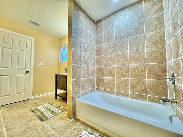 bathroom featuring vanity and tile patterned flooring