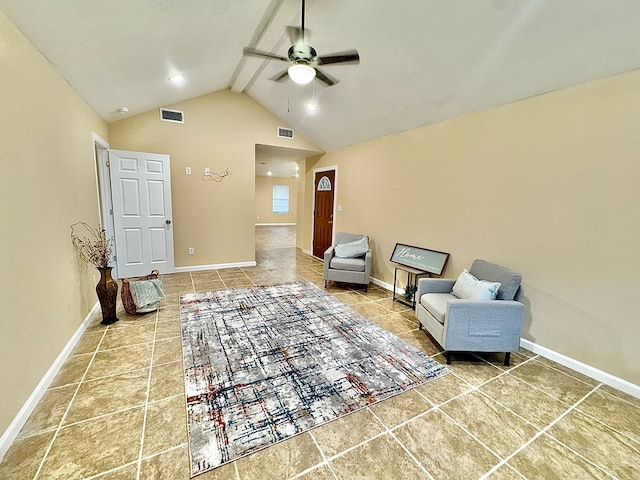 living area with beamed ceiling, high vaulted ceiling, tile patterned flooring, and ceiling fan