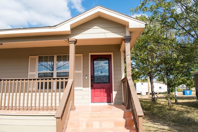 entrance to property with covered porch