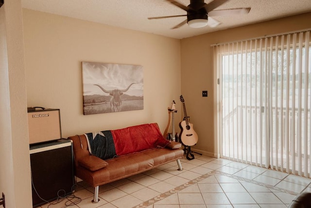 tiled living room with ceiling fan