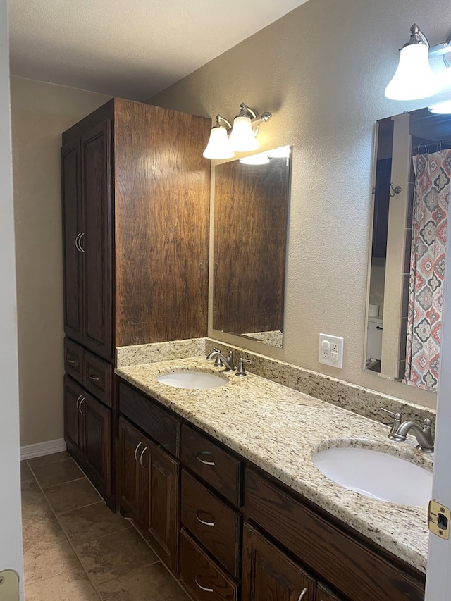 bathroom featuring vanity and tile patterned floors