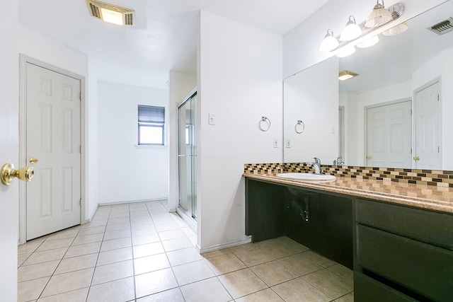 bathroom featuring visible vents, tasteful backsplash, a stall shower, and tile patterned flooring