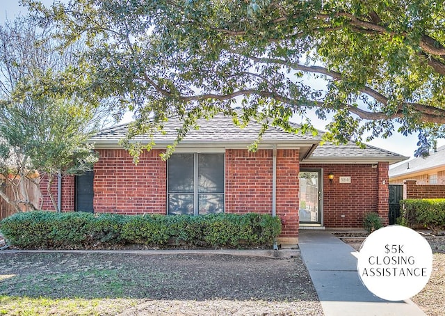 5210 Oak Grove Blvd, San Angelo, TX 76904 - view of front of home with brick siding and a shingled roof
