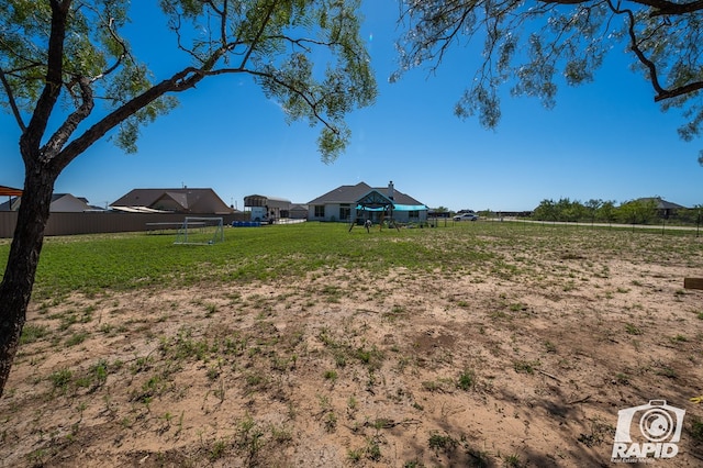 view of yard with fence