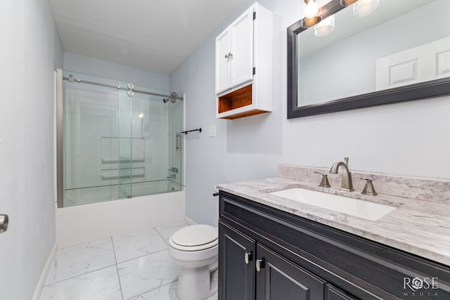 full bathroom featuring vanity, toilet, and combined bath / shower with glass door