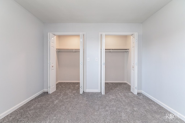 unfurnished bedroom with carpet flooring