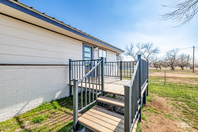 deck featuring a lawn