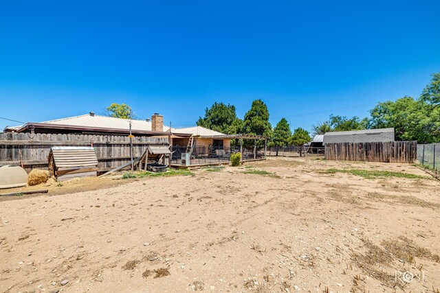 8126 N Fm 2288, San Angelo, TX 76901 - view of yard featuring an outbuilding and an exterior structure