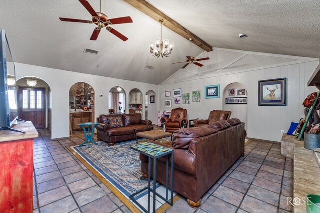 8126 N Fm 2288, San Angelo, TX 76901 - living room featuring a ceiling fan, arched walkways, a textured ceiling, and baseboards