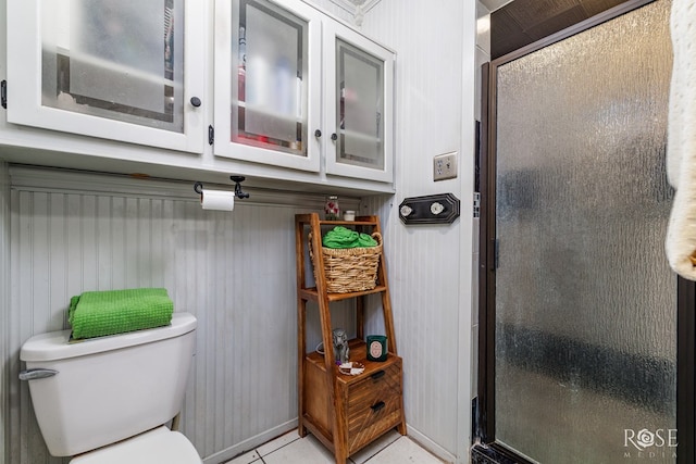 8126 N Fm 2288, San Angelo, TX 76901 - full bathroom with toilet, a stall shower, and tile patterned floors