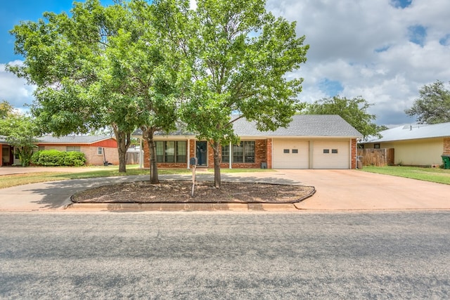 ranch-style home with a garage