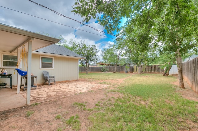 view of yard with a patio area