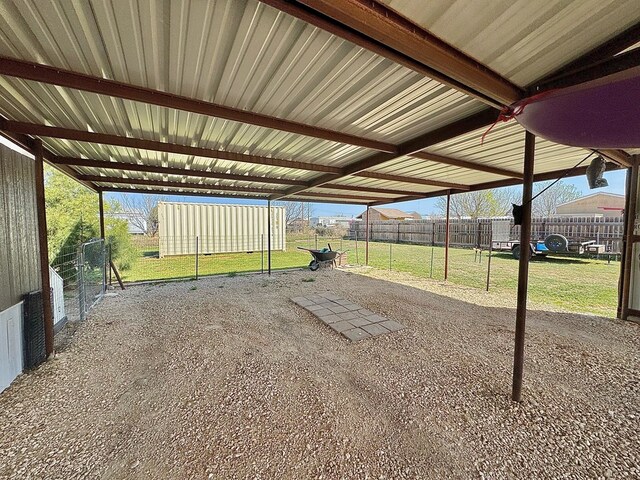 7754 S Copper Mountain Cir, San Angelo, TX 76901 - view of patio / terrace with a carport and an outdoor structure