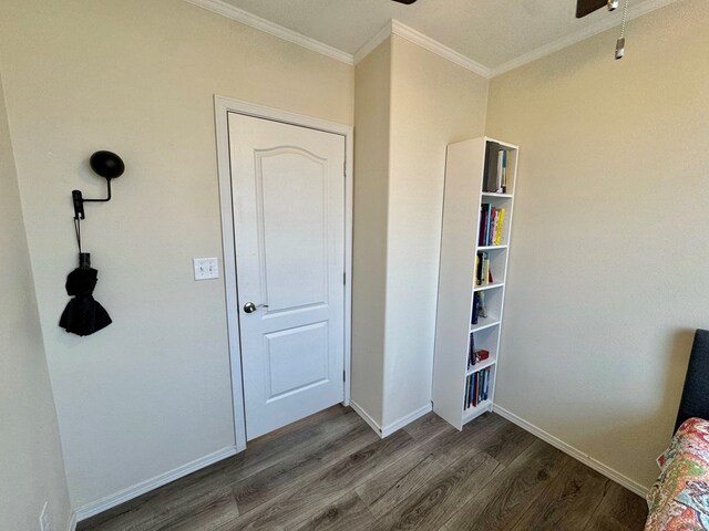 7754 S Copper Mountain Cir, San Angelo, TX 76901 - unfurnished bedroom with dark wood-style floors and ornamental molding