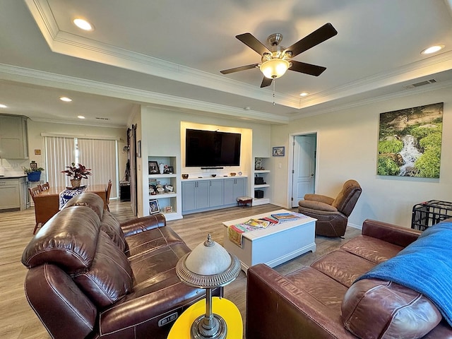 7754 S Copper Mountain Cir, San Angelo, TX 76901 - living room with a tray ceiling, light wood-style floors, crown molding, ceiling fan, and recessed lighting