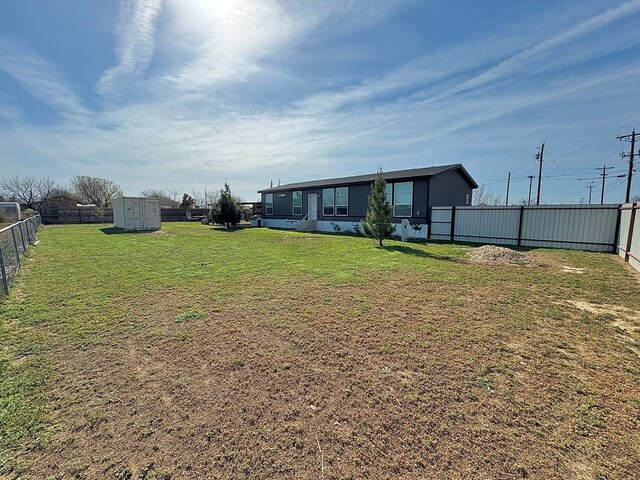 7754 S Copper Mountain Cir, San Angelo, TX 76901 - fenced backyard featuring a storage unit