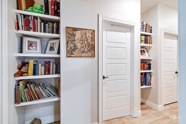 4400 Bobcat Trl, San Angelo, TX 76901 - hallway featuring wood finished floors and baseboards