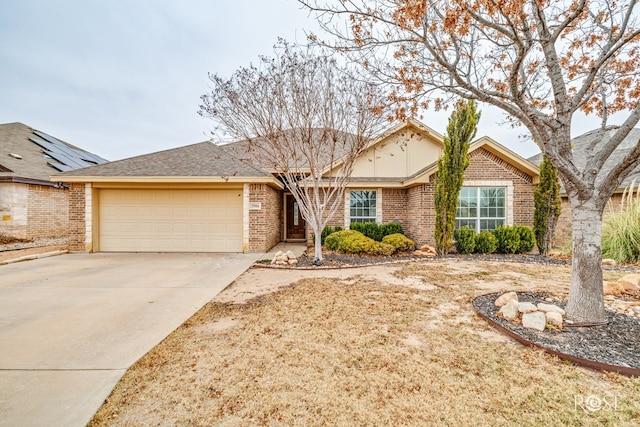 ranch-style house featuring driveway, a garage, and brick siding