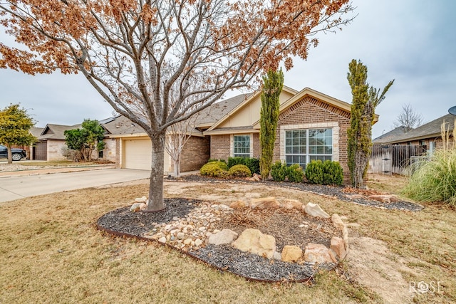 ranch-style home featuring driveway, an attached garage, fence, and brick siding