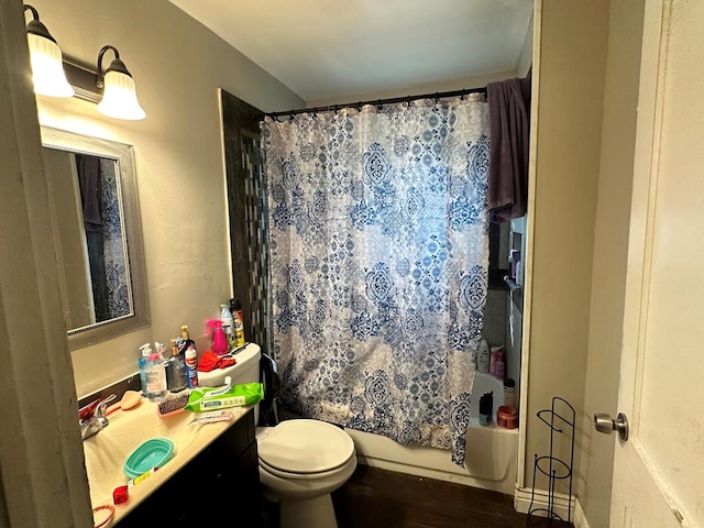 full bathroom featuring hardwood / wood-style flooring, vanity, shower / bathtub combination with curtain, and toilet