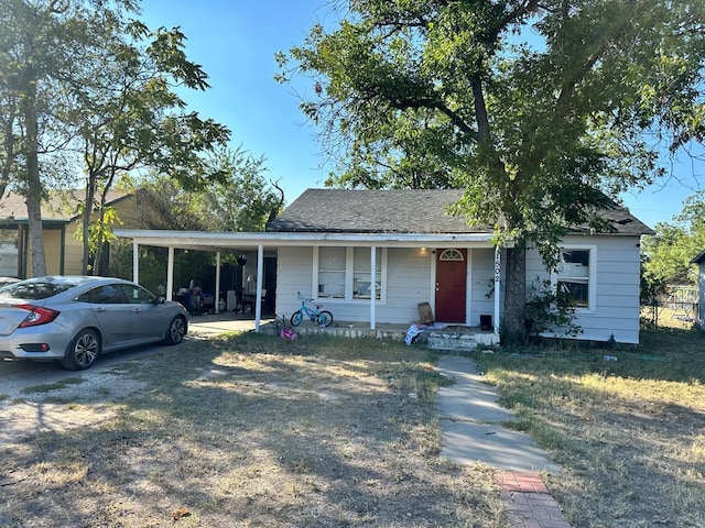 view of front facade with a carport