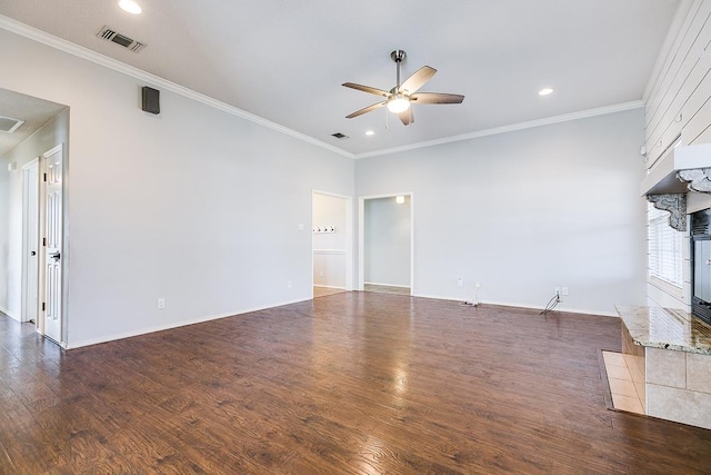 3622 Dominion Rdg, San Angelo, TX 76904 - unfurnished living room with a ceiling fan, recessed lighting, wood finished floors, a large fireplace, and crown molding
