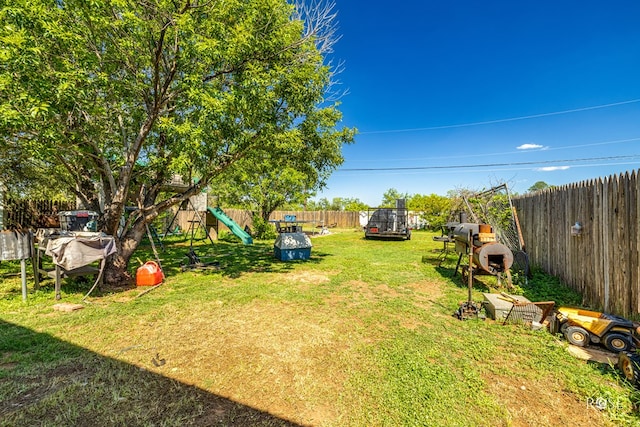 view of yard with a playground