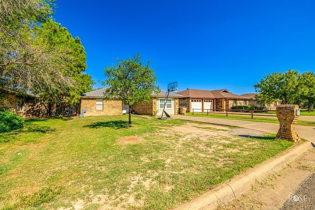 view of yard with a garage