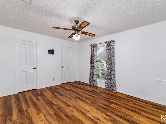 3309 Cedarhill Dr, San Angelo, TX 76904 - spare room with wood finished floors, a ceiling fan, and a textured ceiling