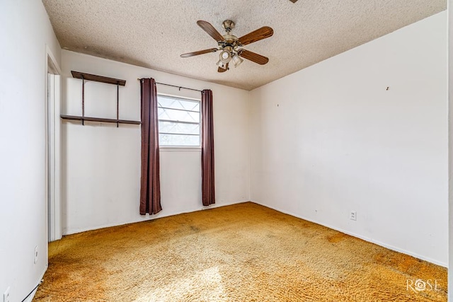 1714 Shady Point Circle Dr, San Angelo, TX 76904 - carpeted spare room with a textured ceiling and a ceiling fan