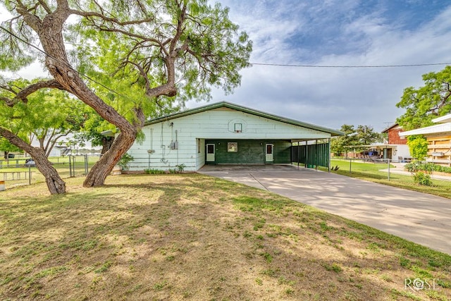 1714 Shady Point Circle Dr, San Angelo, TX 76904 - view of side of property featuring concrete driveway and a carport