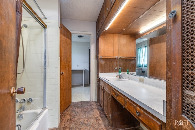 1714 Shady Point Circle Dr, San Angelo, TX 76904 - full bath featuring vanity, shower / bath combination, and a textured ceiling