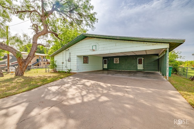 1714 Shady Point Circle Dr, San Angelo, TX 76904 - view of front of home featuring concrete driveway and a carport