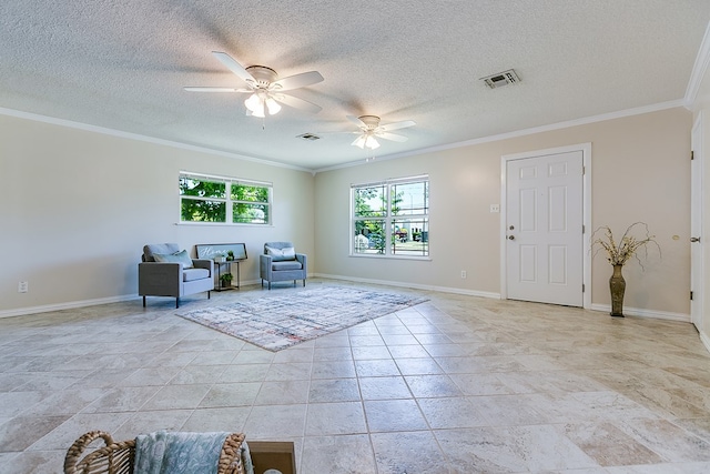 living area with ornamental molding, a ceiling fan, a textured ceiling, baseboards, and light stone finish flooring