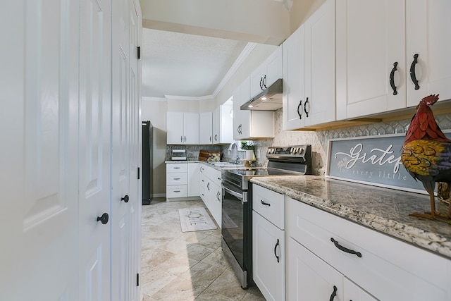 kitchen featuring appliances with stainless steel finishes, ornamental molding, a sink, tasteful backsplash, and white cabinets