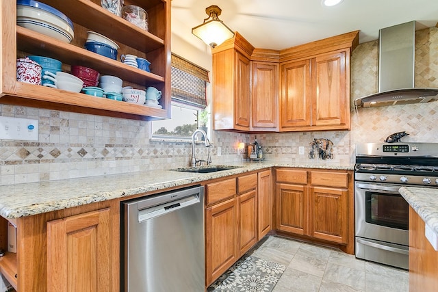 kitchen with stainless steel appliances, light stone countertops, wall chimney range hood, and decorative backsplash