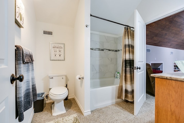 full bathroom featuring toilet, vanity, and shower / bath combo with shower curtain