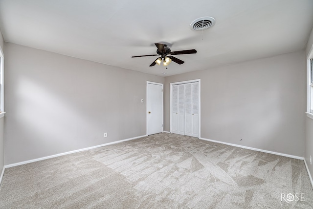 1902 College Hills Blvd, San Angelo, TX 76904 - spare room with ceiling fan, carpet floors, and baseboards