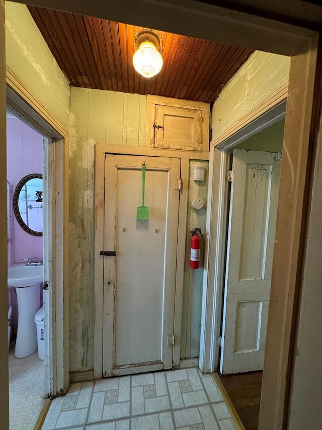 entryway with wooden ceiling